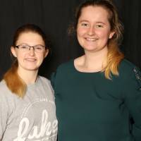 GradFest photo booth of two friends smiling